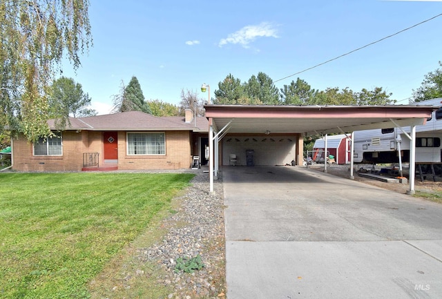 view of front of property featuring a front lawn and a carport