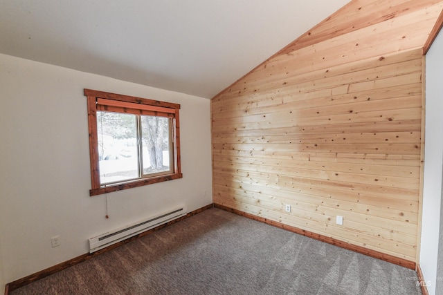1607 Davis Ave Unit C2, Mccall, ID 83638 - spare room with a baseboard radiator, vaulted ceiling, and dark carpet
