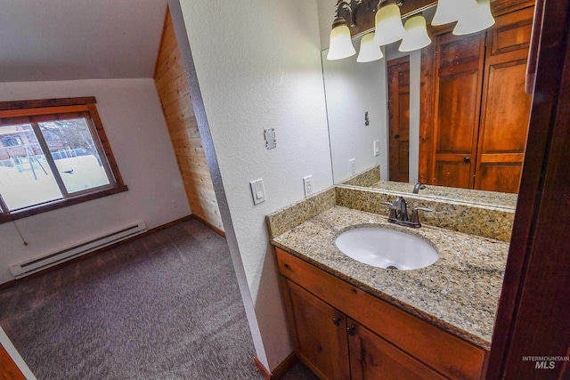 1607 Davis Ave Unit C2, Mccall, ID 83638 - bathroom with a baseboard radiator, vanity, and baseboards