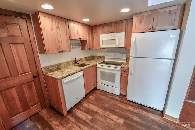 1607 Davis Ave Unit C2, Mccall, ID 83638 - kitchen with white appliances, dark wood-style flooring, light stone counters, a sink, and recessed lighting