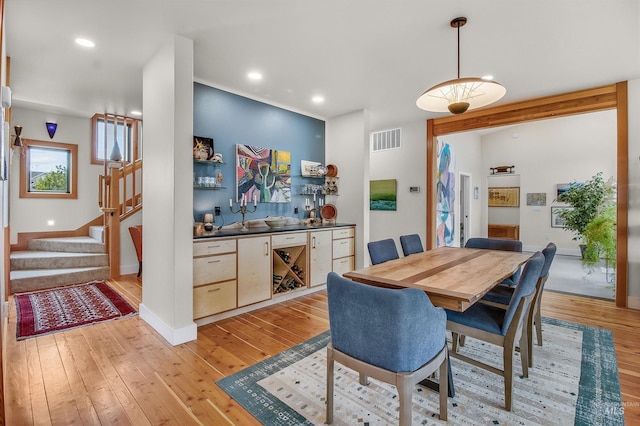 2809 Hampton Ct, Moscow, ID 83843 - dining area featuring light wood-style floors, stairway, baseboards, and recessed lighting