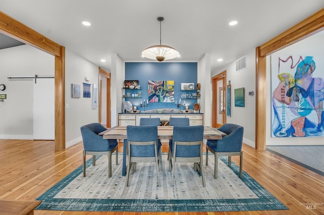 2809 Hampton Ct, Moscow, ID 83843 - dining room featuring wood-type flooring, recessed lighting, and baseboards