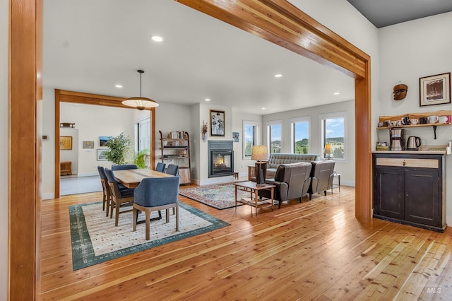 2809 Hampton Ct, Moscow, ID 83843 - dining area with light wood finished floors, recessed lighting, a glass covered fireplace, and baseboards