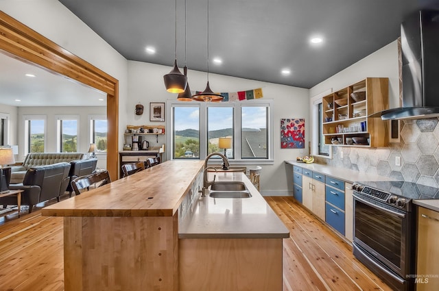 2809 Hampton Ct, Moscow, ID 83843 - kitchen featuring a sink, stainless steel electric range oven, wall chimney range hood, butcher block countertops, and open shelves