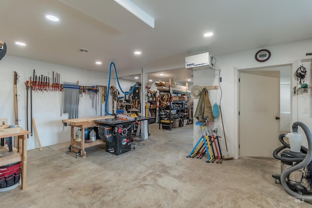 2809 Hampton Ct, Moscow, ID 83843 - garage with a workshop area, recessed lighting, and a heating unit