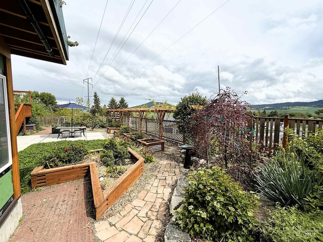 2809 Hampton Ct, Moscow, ID 83843 - fenced backyard with a garden and a patio area