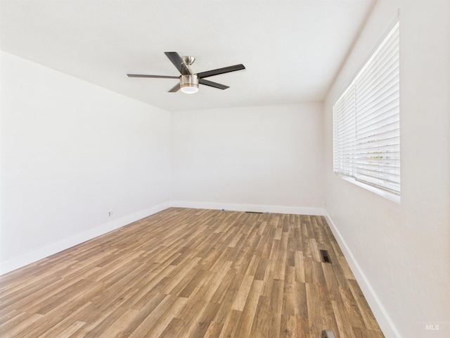 2101 Albion Ave, Burley, ID 83318 - empty room featuring light wood-style flooring, ceiling fan, and baseboards