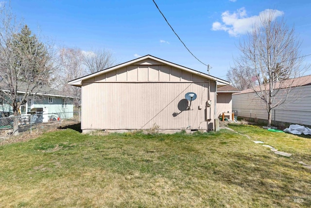 view of outdoor structure with a yard