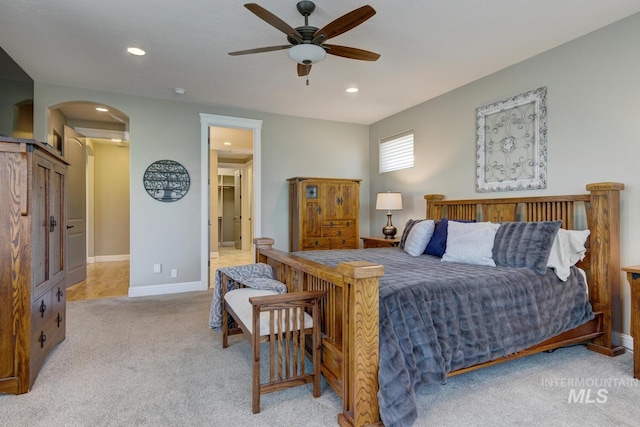 3214 S Arctic Fox Ave, Eagle, ID 83616 - carpeted bedroom featuring arched walkways, recessed lighting, a ceiling fan, and ensuite bathroom