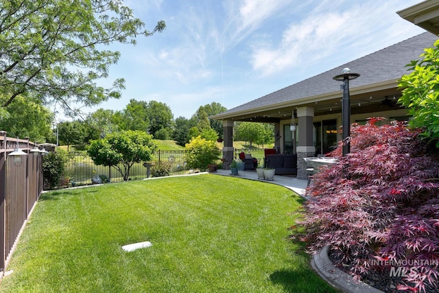 3214 S Arctic Fox Ave, Eagle, ID 83616 - fenced backyard with a patio area