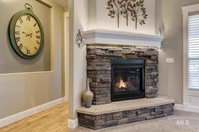 3214 S Arctic Fox Ave, Eagle, ID 83616 - detailed view of a fireplace and wood finished floors