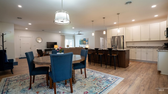1147 Driscoll Ridge Rd, Troy, ID 83871 - dining area featuring light wood-style flooring and recessed lighting