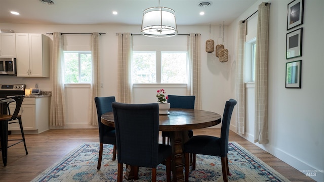 1147 Driscoll Ridge Rd, Troy, ID 83871 - dining space with baseboards, light wood-style floors, and recessed lighting