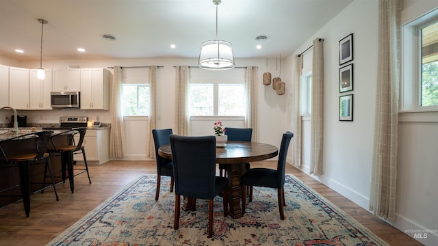 1147 Driscoll Ridge Rd, Troy, ID 83871 - dining area featuring light wood-style floors, baseboards, and recessed lighting