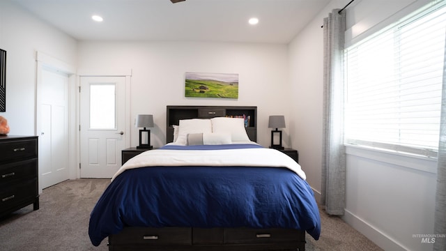 1147 Driscoll Ridge Rd, Troy, ID 83871 - bedroom with light colored carpet, multiple windows, recessed lighting, and baseboards