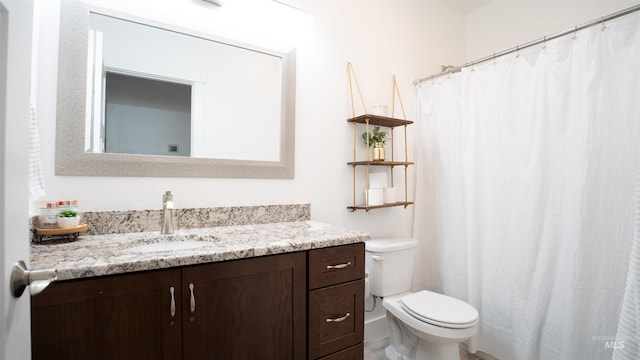 1147 Driscoll Ridge Rd, Troy, ID 83871 - full bathroom featuring toilet, vanity, and a shower with shower curtain