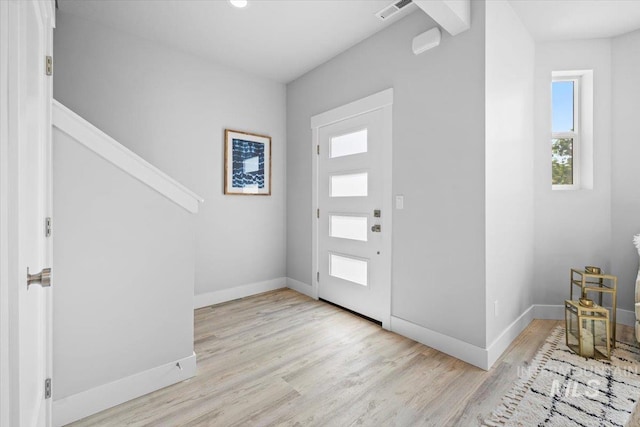 foyer entrance featuring light wood-type flooring