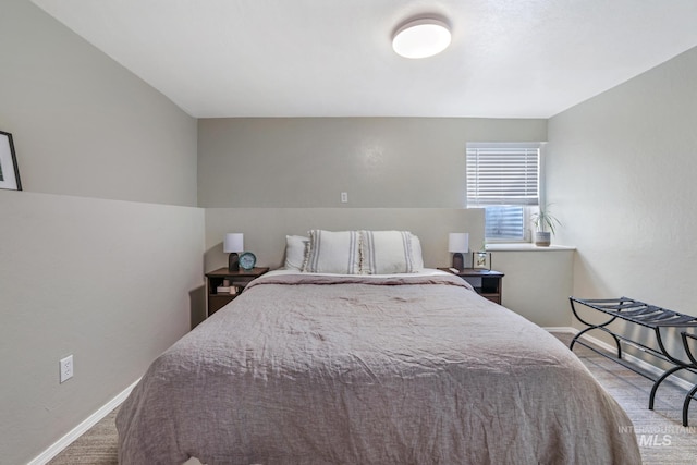 bedroom featuring baseboards