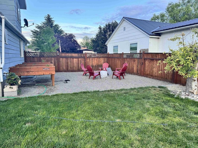 view of yard featuring a fenced backyard and a patio