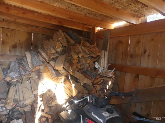 309 Wildrose Ln, Anatone, WA 99401 - miscellaneous room with wood walls and beamed ceiling