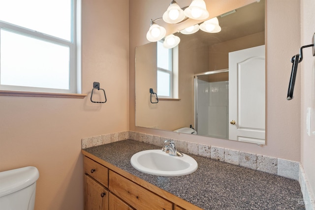 1141 Liberty Dr, Clarkston, WA 99403 - full bath featuring toilet, an enclosed shower, and vanity
