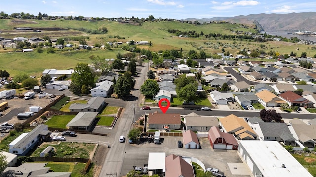 1141 Liberty Dr, Clarkston, WA 99403 - aerial view of property and surrounding area with a mountainous background and nearby suburban area
