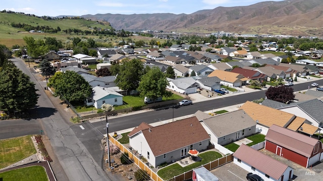1141 Liberty Dr, Clarkston, WA 99403 - aerial perspective of suburban area with a mountain backdrop