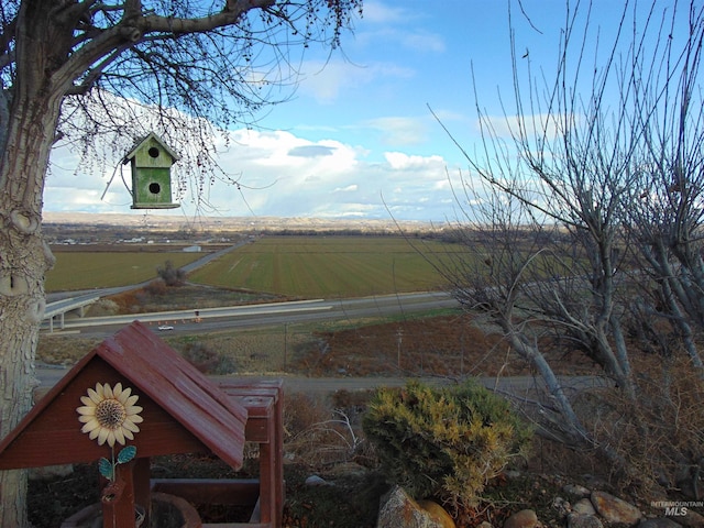 property view of mountains featuring a rural view