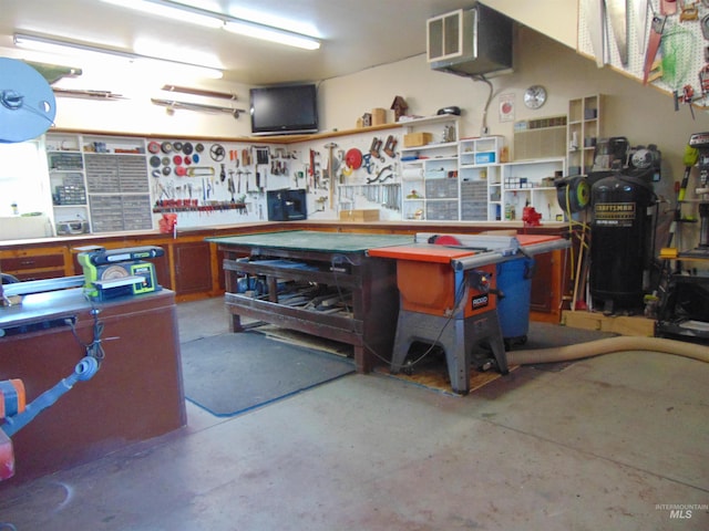 garage featuring a workshop area