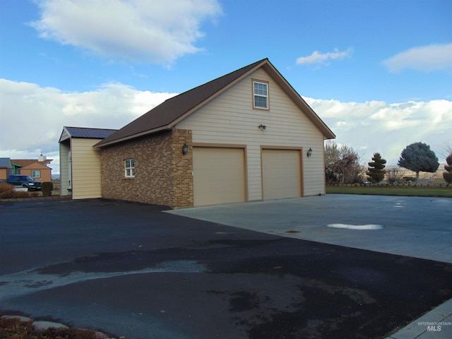 exterior space featuring a garage