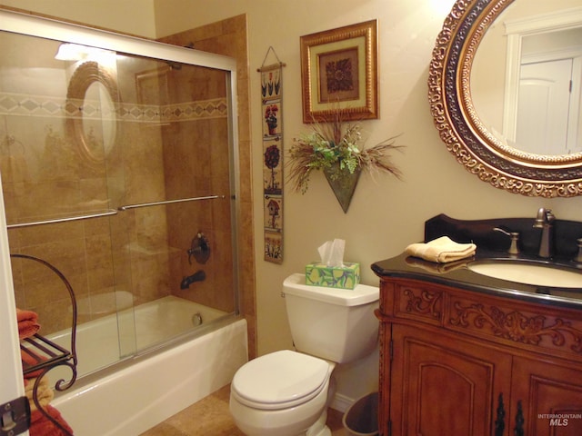 full bathroom with shower / bath combination with glass door, toilet, and vanity