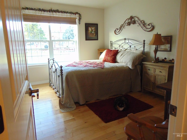 bedroom featuring light hardwood / wood-style floors