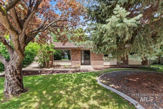 3493 N Buckboard Way, Boise, ID 83713 - view of front of property with brick siding and a front yard