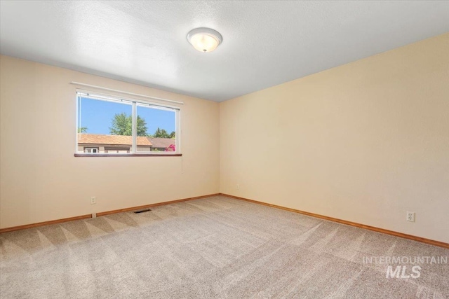 3493 N Buckboard Way, Boise, ID 83713 - carpeted spare room with baseboards