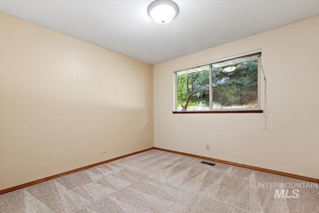 3493 N Buckboard Way, Boise, ID 83713 - unfurnished room featuring light carpet and baseboards
