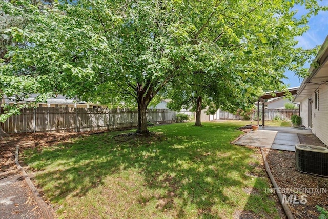 3493 N Buckboard Way, Boise, ID 83713 - fenced backyard featuring a patio area