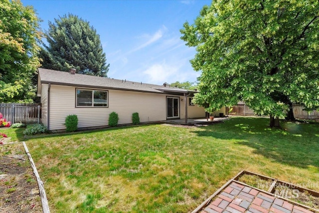 3493 N Buckboard Way, Boise, ID 83713 - back of house featuring a fenced backyard and a patio area