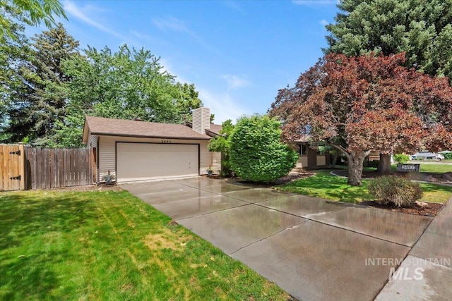 3493 N Buckboard Way, Boise, ID 83713 - obstructed view of property with a chimney, driveway, and a garage