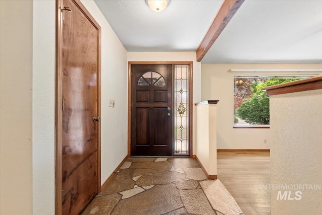 3493 N Buckboard Way, Boise, ID 83713 - foyer featuring beam ceiling and wood finished floors