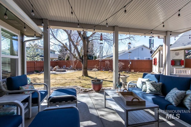 view of patio / terrace featuring a fenced backyard and an outdoor living space