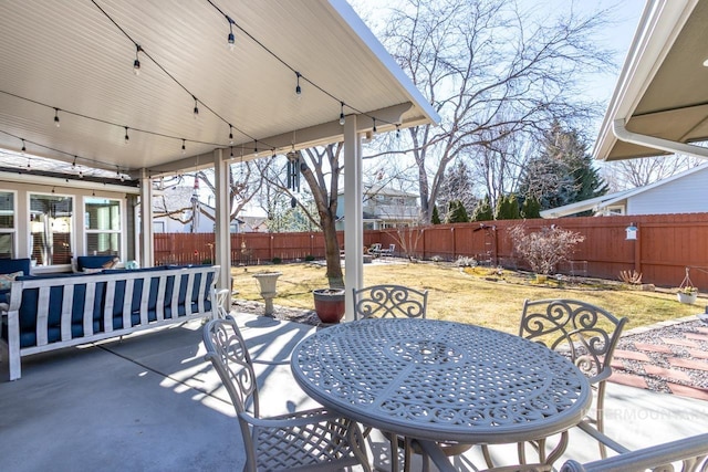 view of patio / terrace with a fenced backyard and outdoor dining space