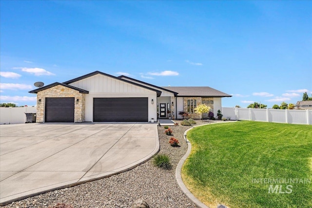 3490 E 3600 N, Kimberly, ID 83341 - view of front of home featuring a garage, driveway, and stone siding