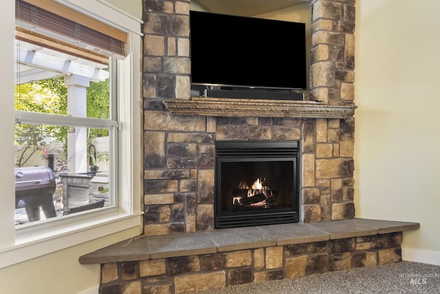2310 W Herron Loop, Nampa, ID 83686 - detailed view of baseboards and a stone fireplace