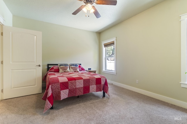 2310 W Herron Loop, Nampa, ID 83686 - carpeted bedroom featuring baseboards and ceiling fan