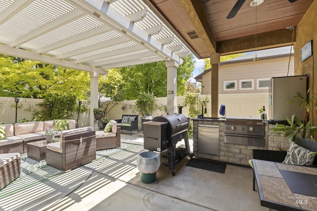 2310 W Herron Loop, Nampa, ID 83686 - fenced backyard featuring outdoor lounge area, area for grilling, ceiling fan, and a patio area