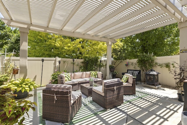 2310 W Herron Loop, Nampa, ID 83686 - fenced backyard featuring an outdoor hangout area, a pergola, and a patio