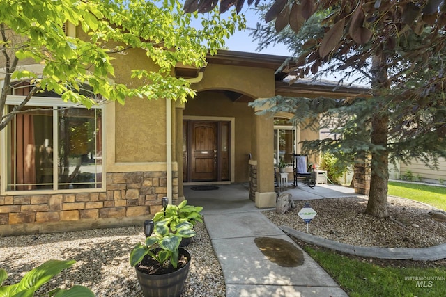 2310 W Herron Loop, Nampa, ID 83686 - property entrance featuring stone siding and stucco siding