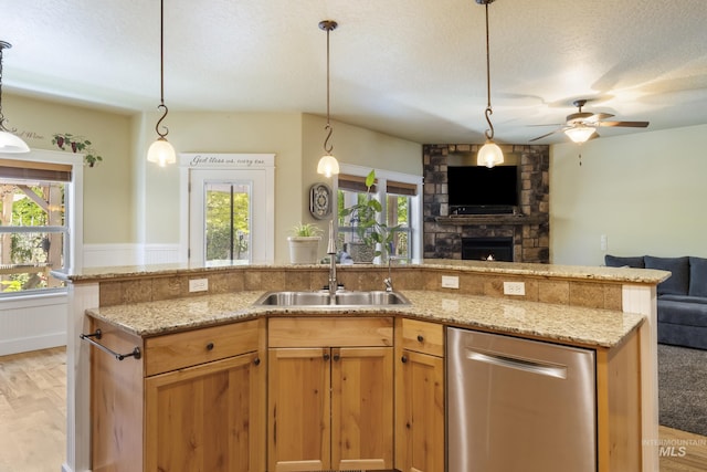 2310 W Herron Loop, Nampa, ID 83686 - kitchen with open floor plan, dishwasher, a textured ceiling, a ceiling fan, and light stone counters
