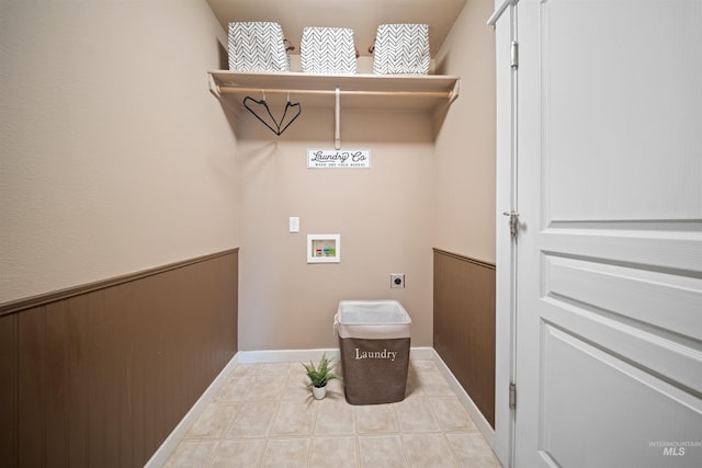 laundry room featuring light tile patterned floors, laundry area, hookup for a washing machine, and hookup for an electric dryer