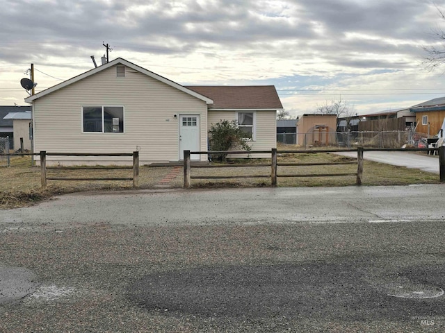 view of front of property with a fenced front yard